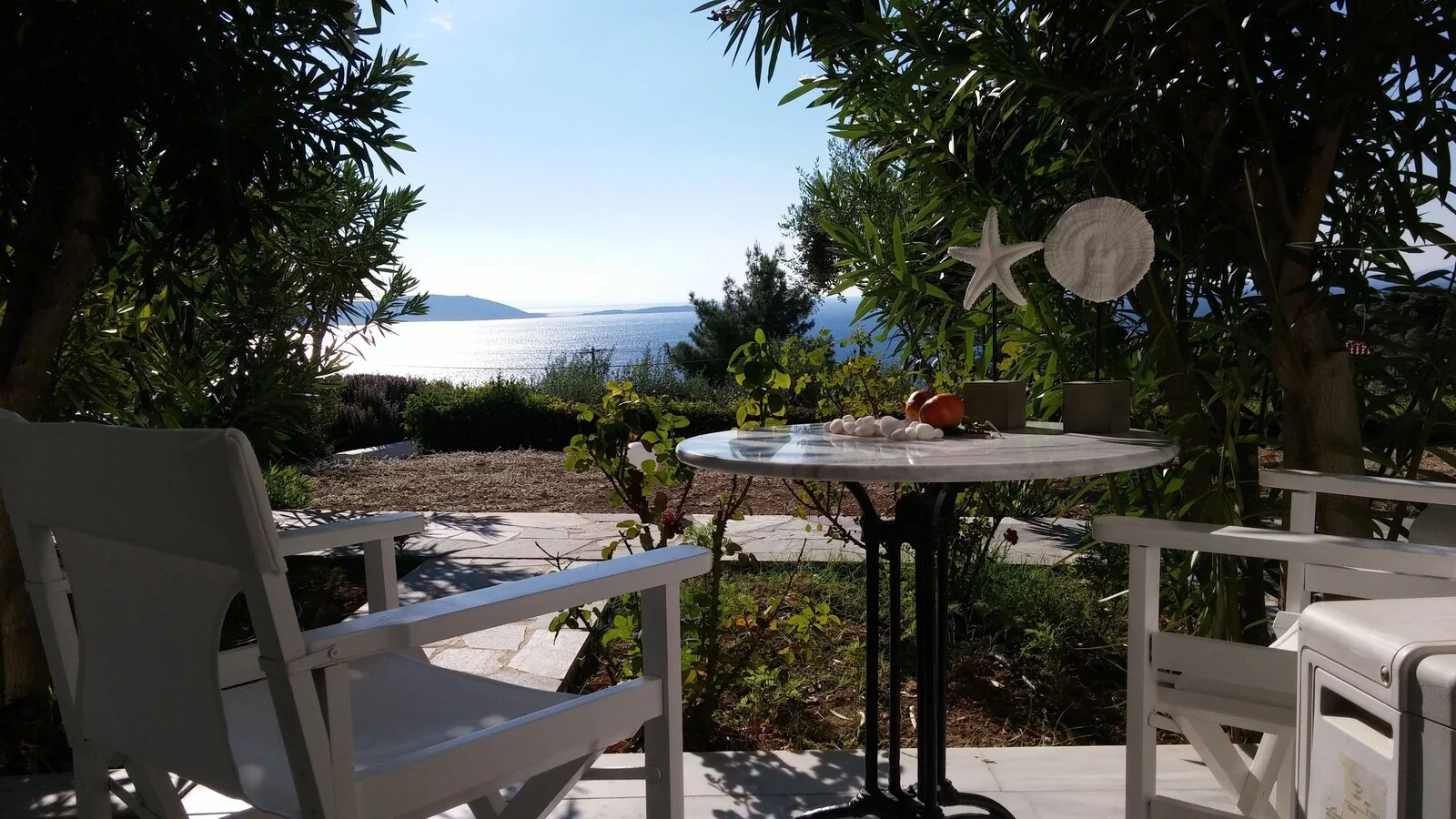 Shaded outdoor table and chairs